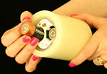 Just insert batteries into the bottom of the candle