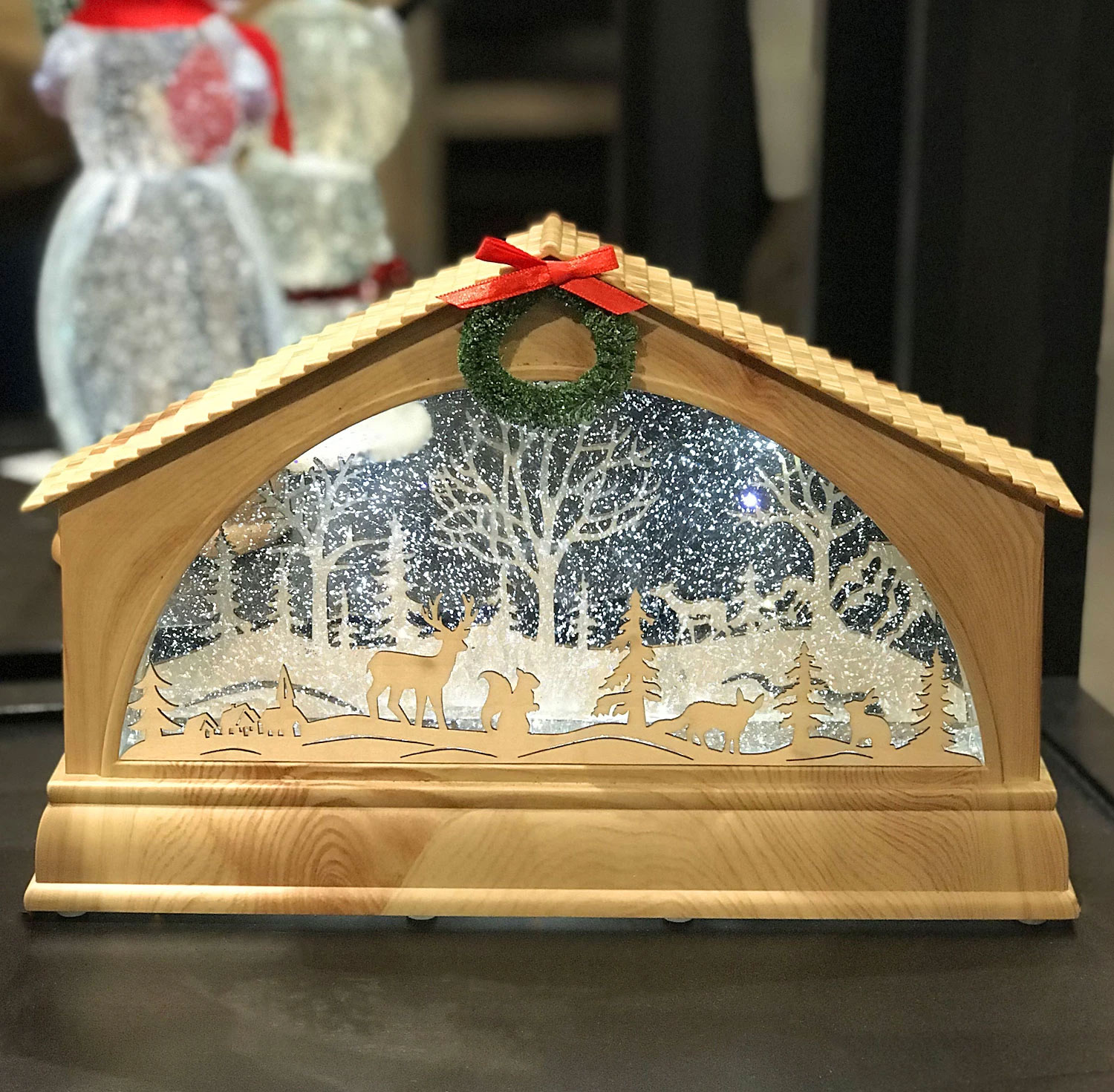 Lighted cardinal musical snow globe on pedestal Wood Lighted Water Lantern With Carved Winter Scene In Swirling Glitter