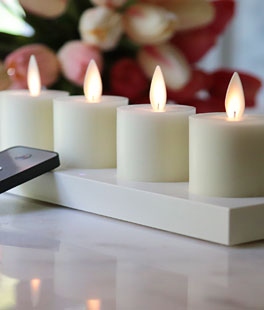 Set of 4 Ivory Wax Tealights With Rechargeable Base and Remote Included